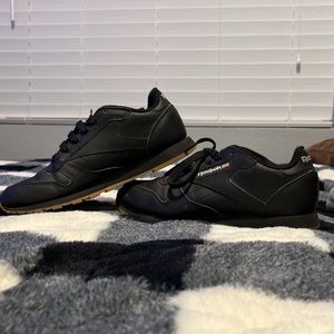 All black Classic Reebok
